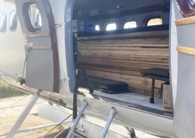 Plane loaded with cabin materials